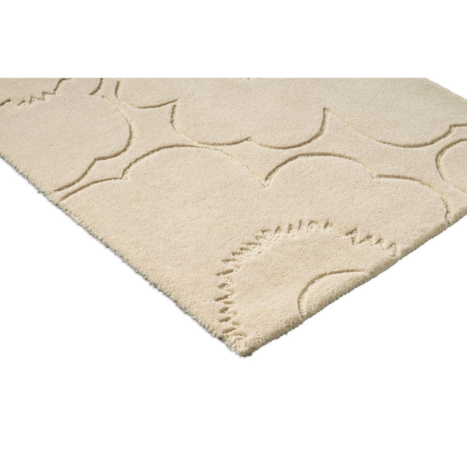 Marimekko Piirto Unikko runner rug featuring floral motif in cream and beige on white background, hand-tufted wool