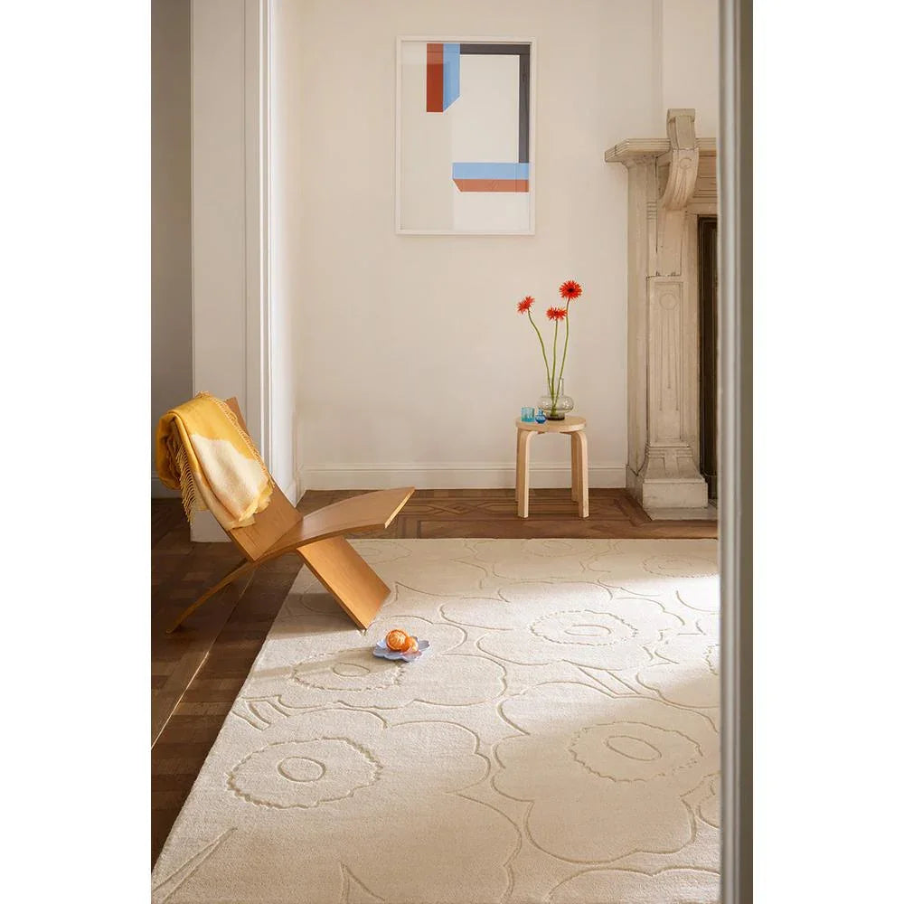 Marimekko Piirto Unikko Rug featuring Unikko floral pattern in ivory and beige on cream background, machine-woven wool