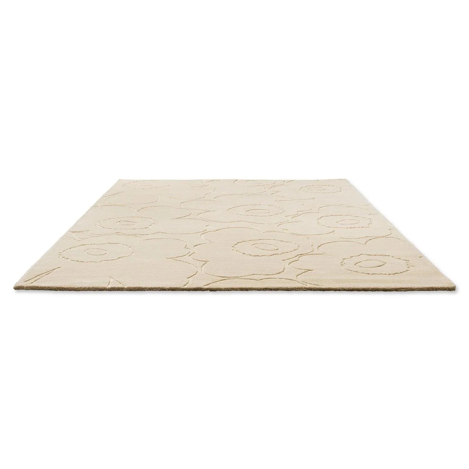 Marimekko Piirto Unikko Natural White Rug featuring floral pattern in cream, beige and taupe on white background, hand-tufted wool