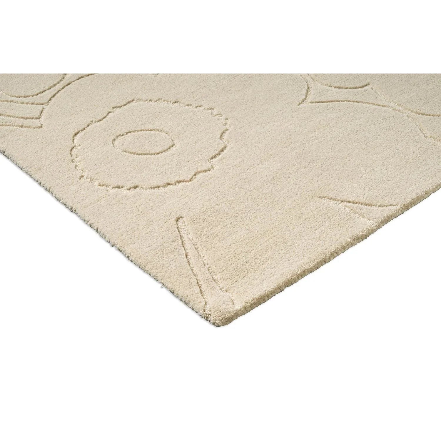 Marimekko Piirto Unikko rug featuring floral pattern in cream, ivory and beige on beige background, hand-tufted wool