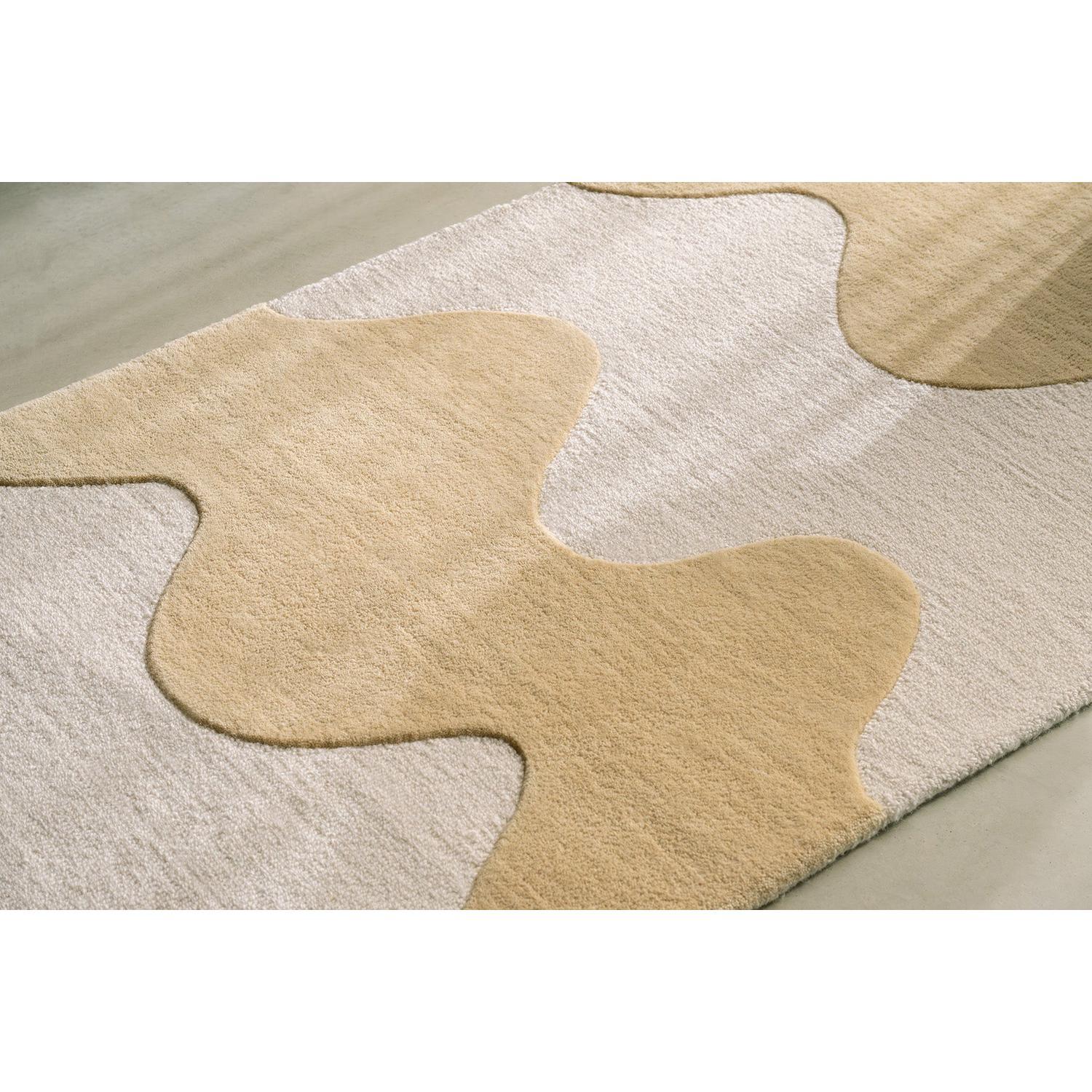 Marimekko Lokki Butter Runner Rug featuring abstract shapes in butter-beige and ivory on white machine-made wool