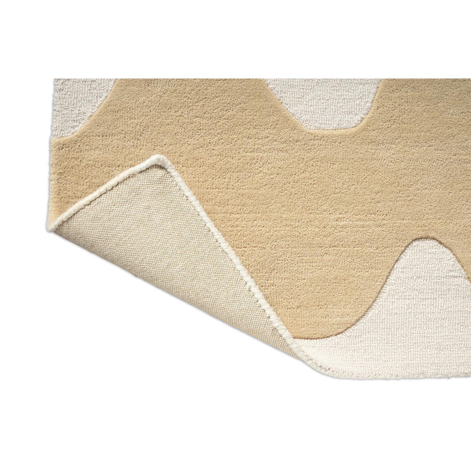 Marimekko Lokki Butter Runner Rug featuring abstract shapes in butter, cream, ivory on ivory background, tufted wool