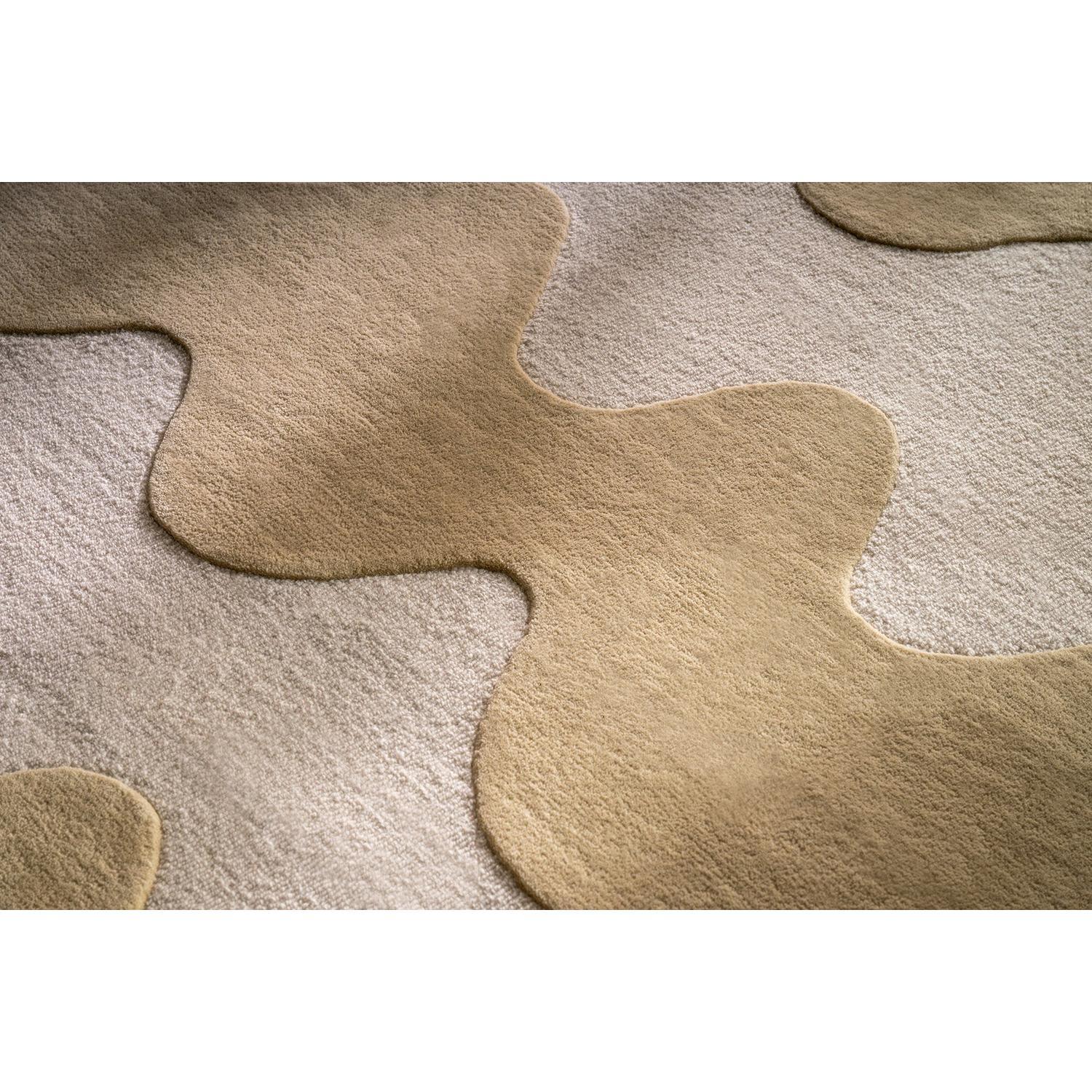 Marimekko Lokki Butter 133901 Rug featuring abstract organic shapes in butter, sand and cream on cream background, hand-tufted wool