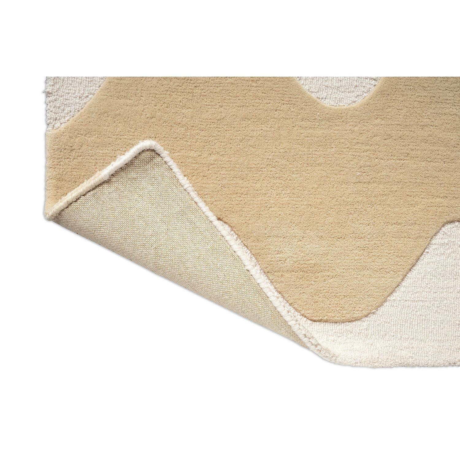 Marimekko Lokki Butter 133901 Rug with abstract shapes in butter yellow ivory and cream on cream background, tufted wool