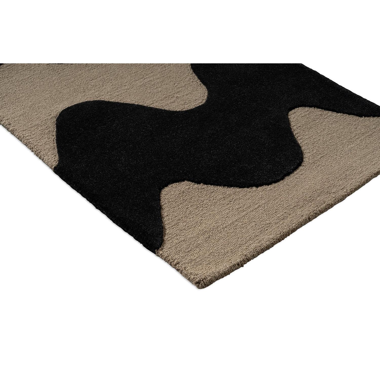 Marimekko Lokki Black Runner Rug featuring abstract pattern in black and taupe on beige background, tufted wool