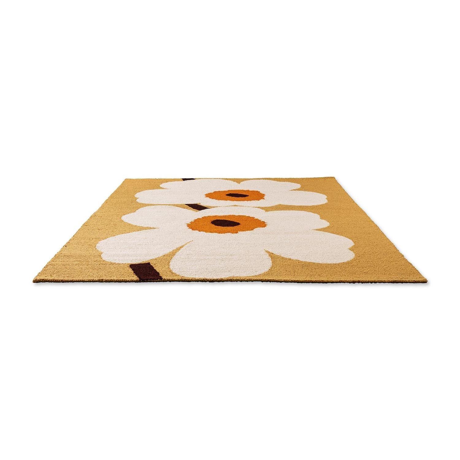 Marimekko Unikko Anniversary Honey Outdoor Rug featuring bold floral pattern in white and orange on honey yellow, woven polypropylene
