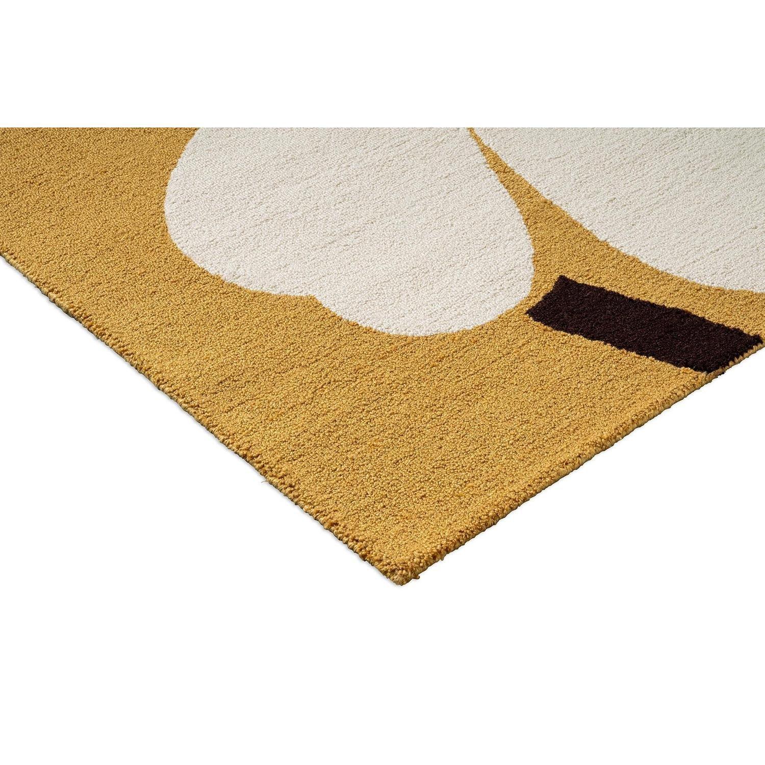 Marimekko Unikko Honey Outdoor Rug featuring poppy motif in ivory cream on honey-yellow, machine-woven polypropylene