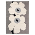 Marimekko Unikko Outdoor Rug featuring floral cream on grey background with black centres, machine-woven polypropylene