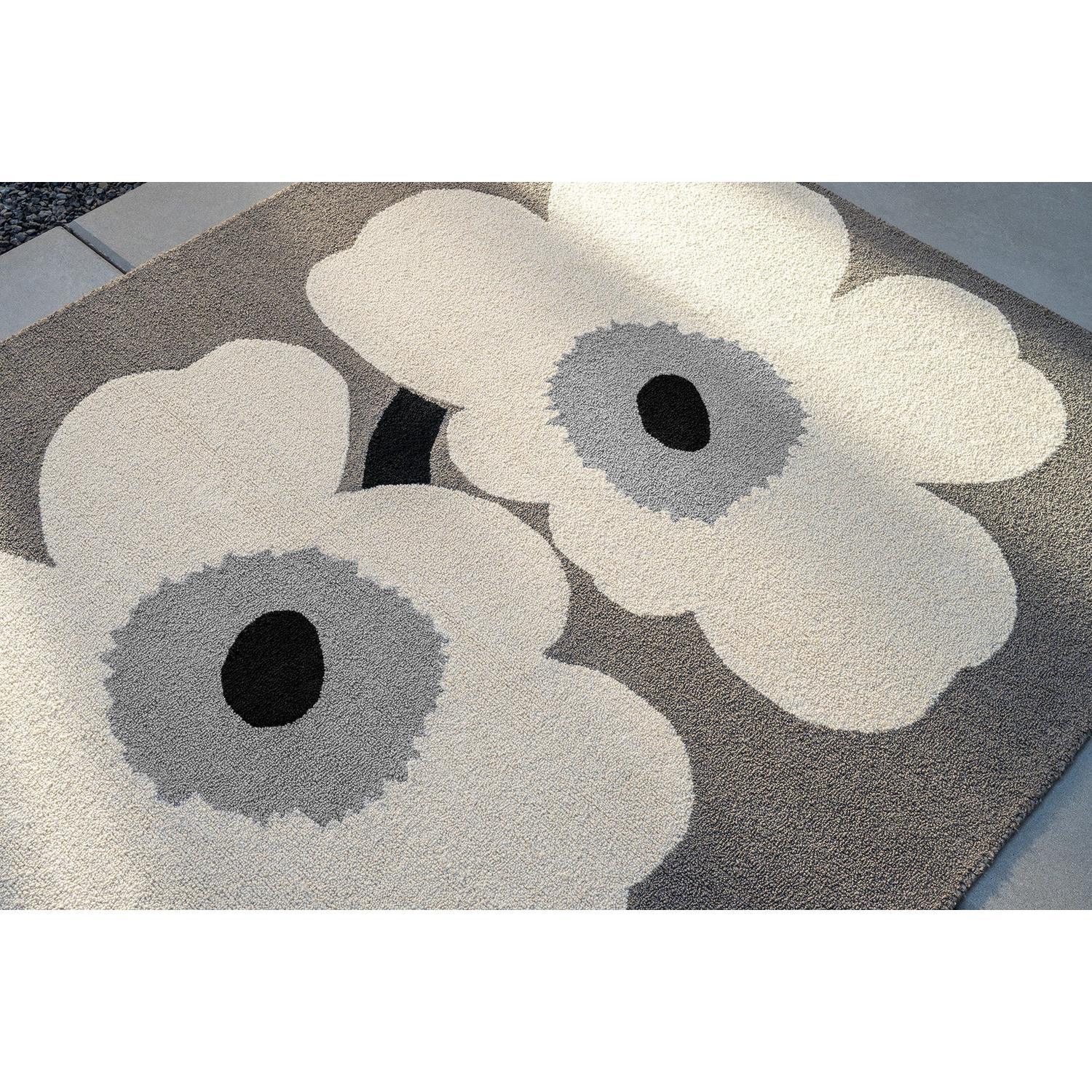 Marimekko Unikko Anniversary Grey Outdoor Rug featuring cream and grey floral pattern on taupe background machine-made PP
