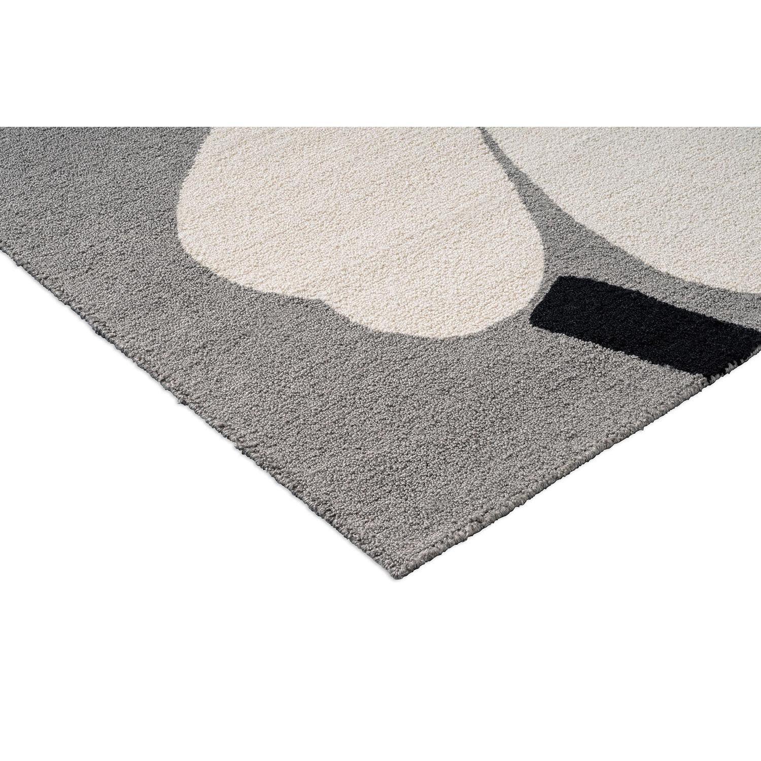 Marimekko Unikko Anniversary Rug featuring abstract circles in cream, ivory and charcoal on slate loomed polypropylene