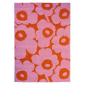 Marimekko Unikko Pink Orange Outdoor Rug featuring pink floral pattern on orange background, machine-made polypropylene