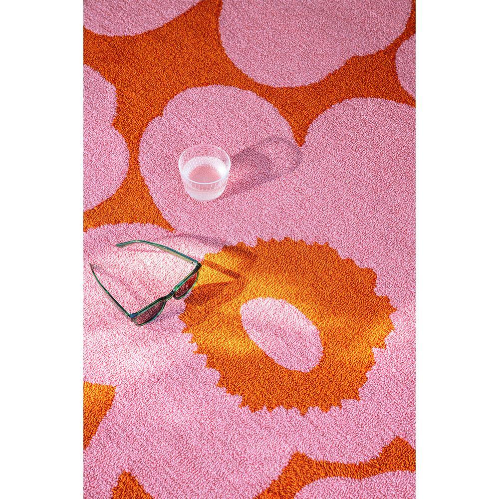 Marimekko Unikko Pink Orange Outdoor 434302 Rug featuring poppy pattern in hot pink and orange on hot pink field woven polypropylene