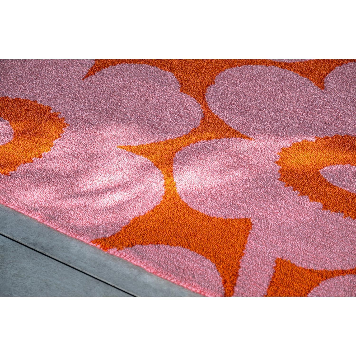 Marimekko Unikko Pink Orange Outdoor 434302 Rug featuring pink and orange floral pattern on light pink background