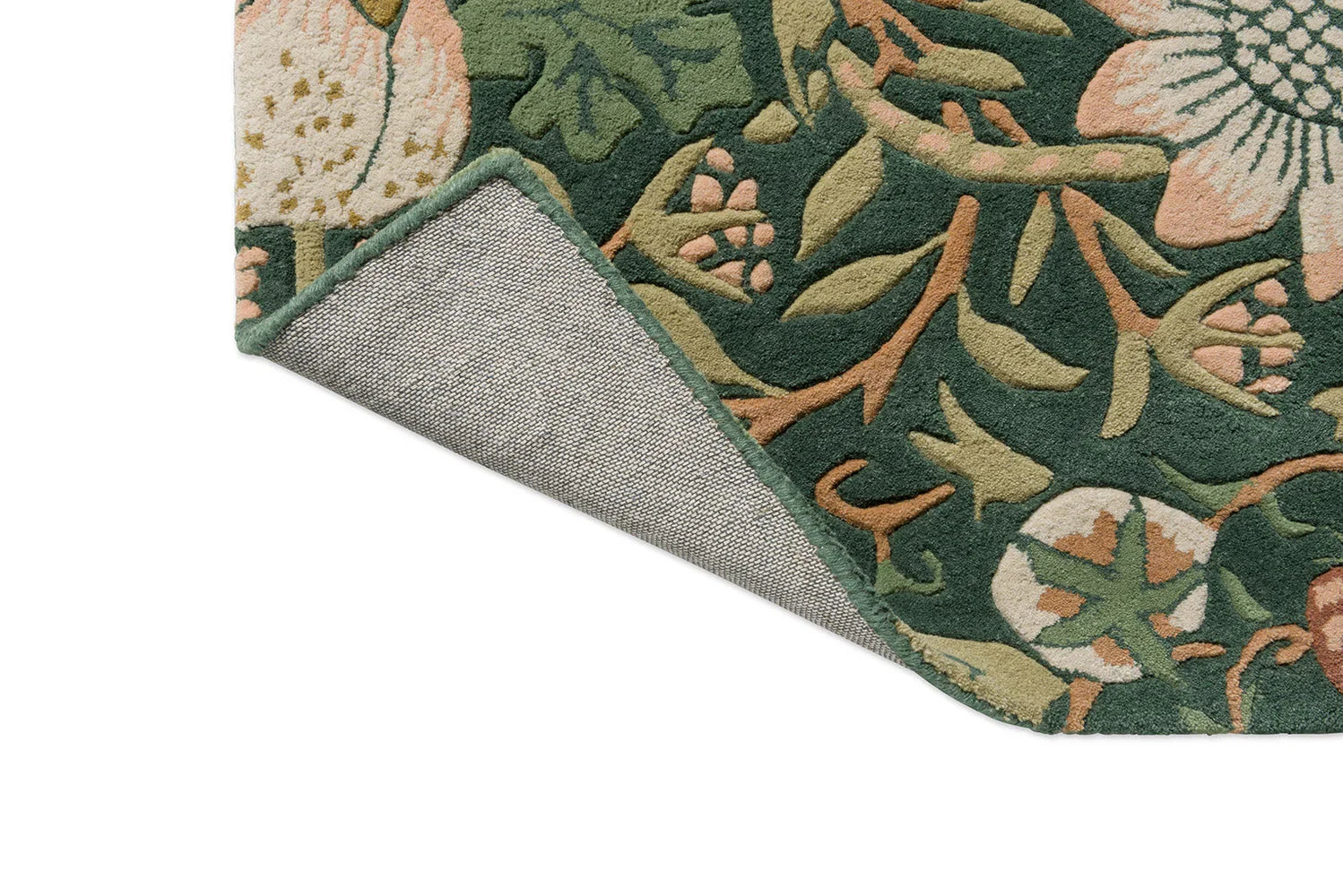 Morris & Co Strawberry Thief Forest Rug featuring floral pattern in forest green, sage, blush pink, ochre on dark green background, hand-tufted wool