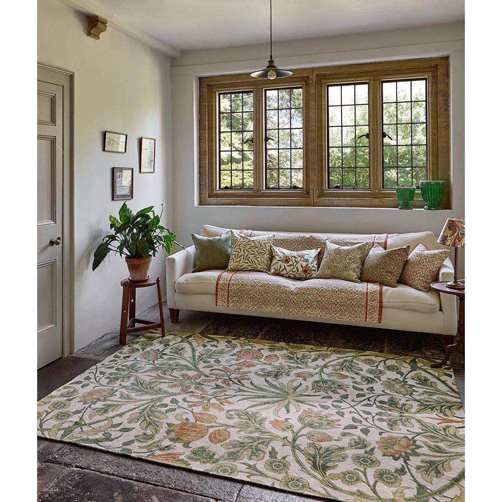 Morris & Co Hyacinth Natural designer rug featuring botanical floral pattern in cream, sage-green, peach on natural background, hand-tufted wool