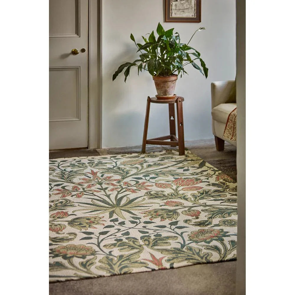 Morris & Co Hyacinth Natural Designer Rug featuring floral vine pattern in sage green, dusty pink, cream and taupe on ivory background, hand-tufted wool