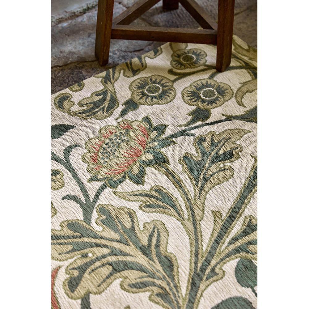 Morris & Co Hyacinth Natural Designer Rug featuring botanical floral pattern in olive green, sage and beige on natural background, hand-tufted wool