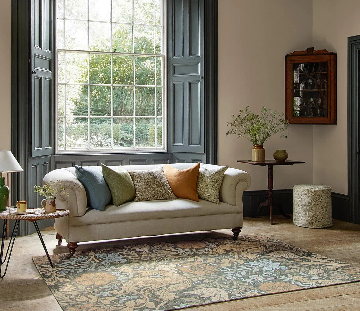 Morris & Co Compton Trellis Rug featuring trellis floral pattern in sage green, teal, beige on cream background, hand-tufted wool