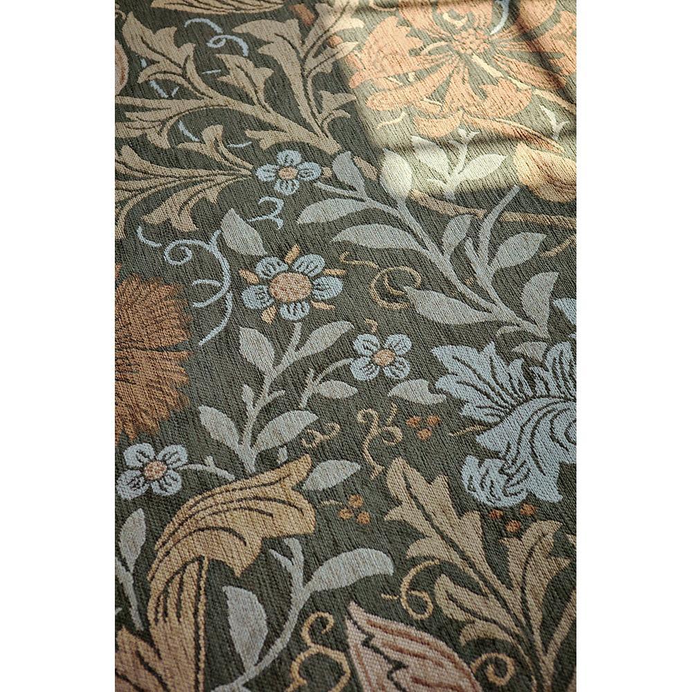 Morris & Co Compton Trellis rug featuring botanical pattern in olive, sage, dusty blue and ochre on dark background, hand-tufted wool