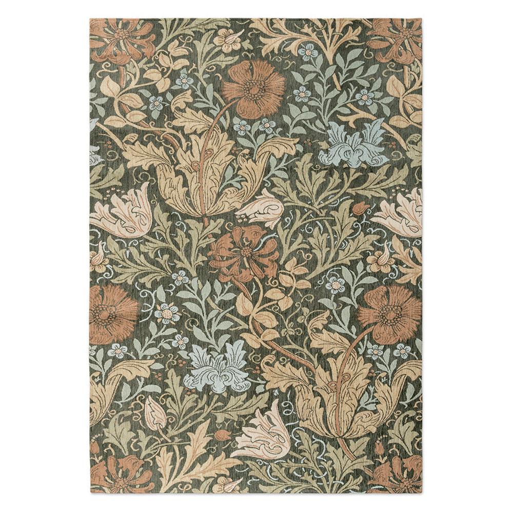 Morris and Co Compton Trellis jacquard woven rug featuring John Henry Dearle 1895 design with oversized tulips, poppies, and acanthus leaves arranged along diagonal trellis in terracotta, coral pink, sage green, powder blue, and cream on olive green background
