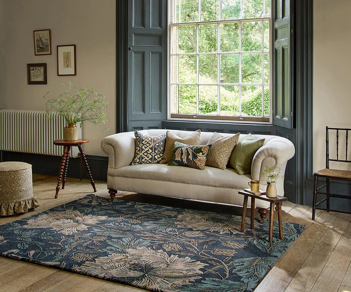 Morris & Co Honeysuckle & Tulip Designer Rug featuring botanical floral pattern in navy blue, teal, cream and sage on deep blue background, power-loomed wool
