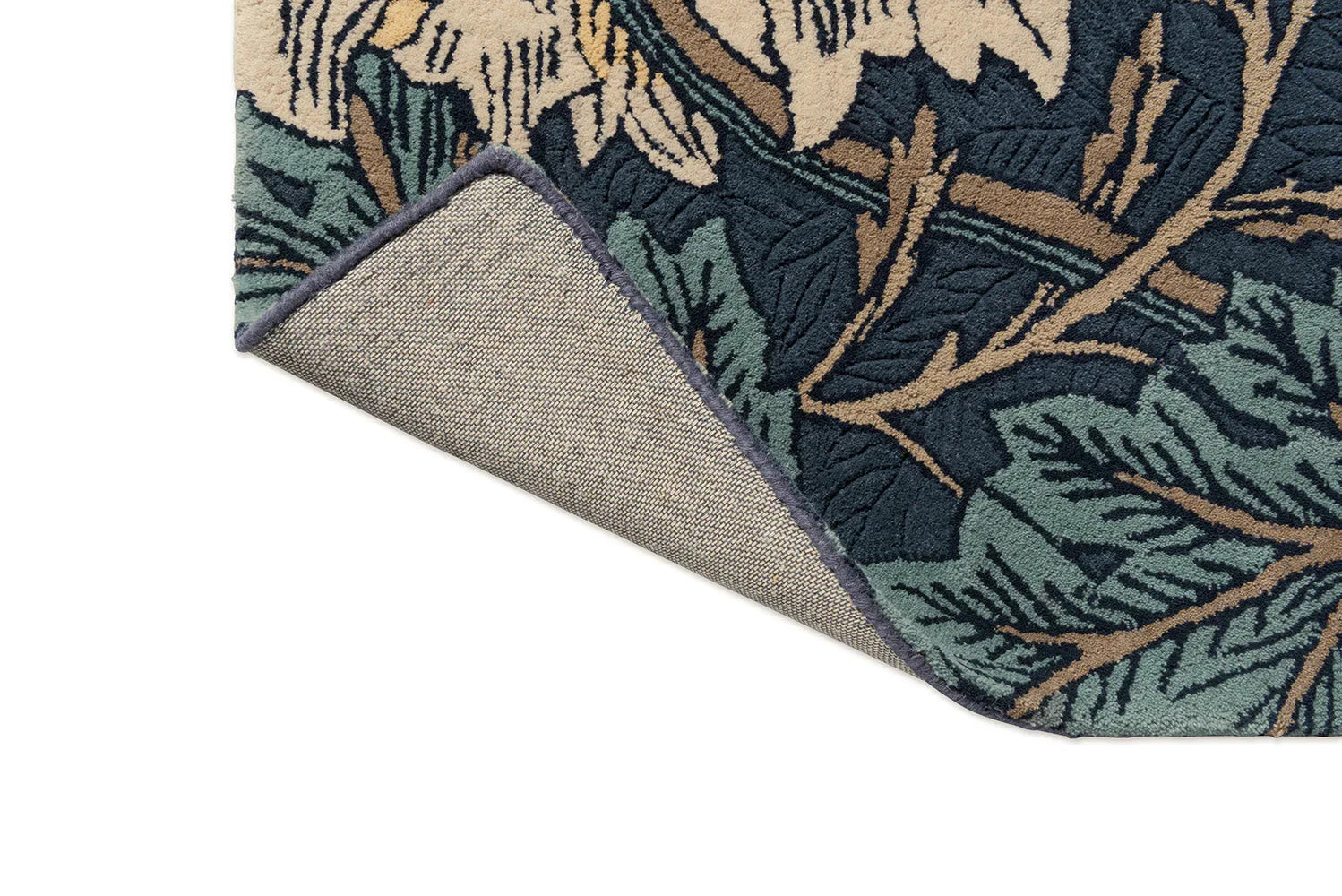 Morris & Co Honeysuckle & Tulip rug featuring botanical pattern in navy blue, woad, thyme & ochre on cream background, hand-tufted wool
