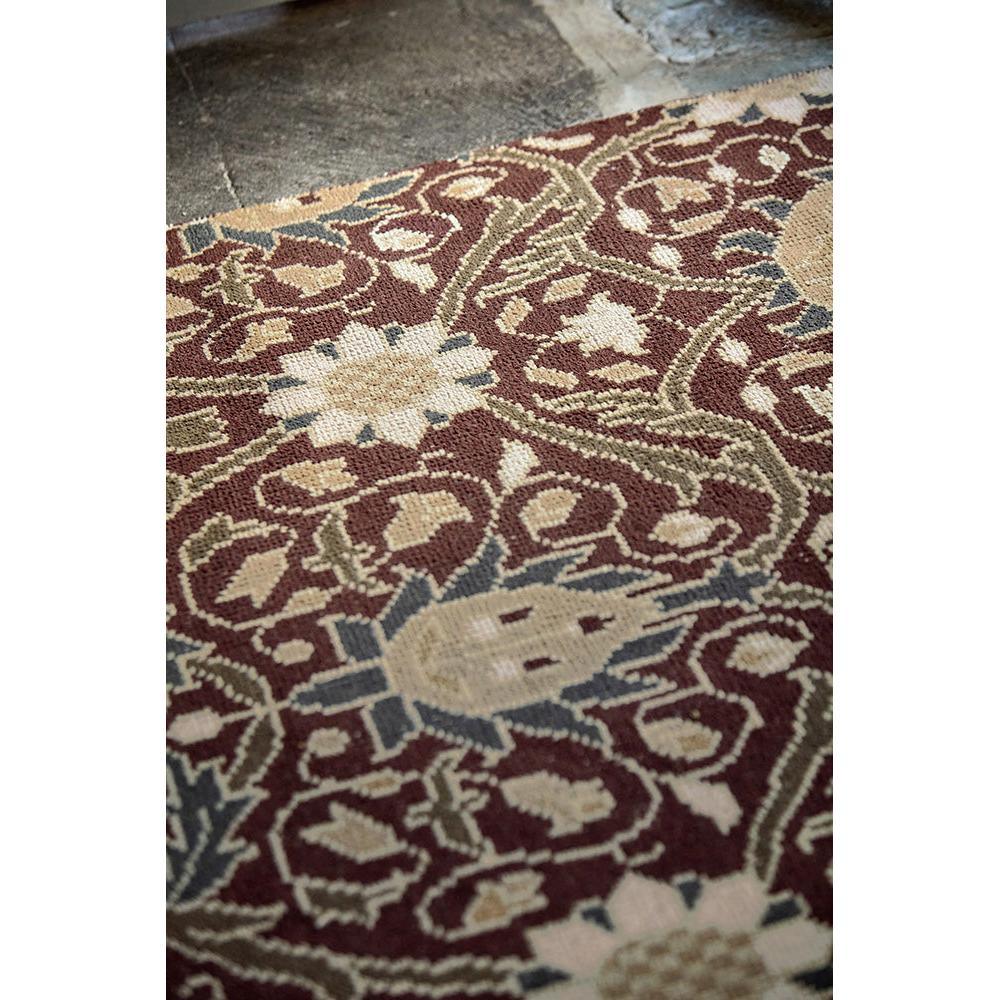 Morris & Co Montreal Russet Rug featuring botanical floral pattern in burgundy, cream and blue-grey on russet background, hand-tufted wool
