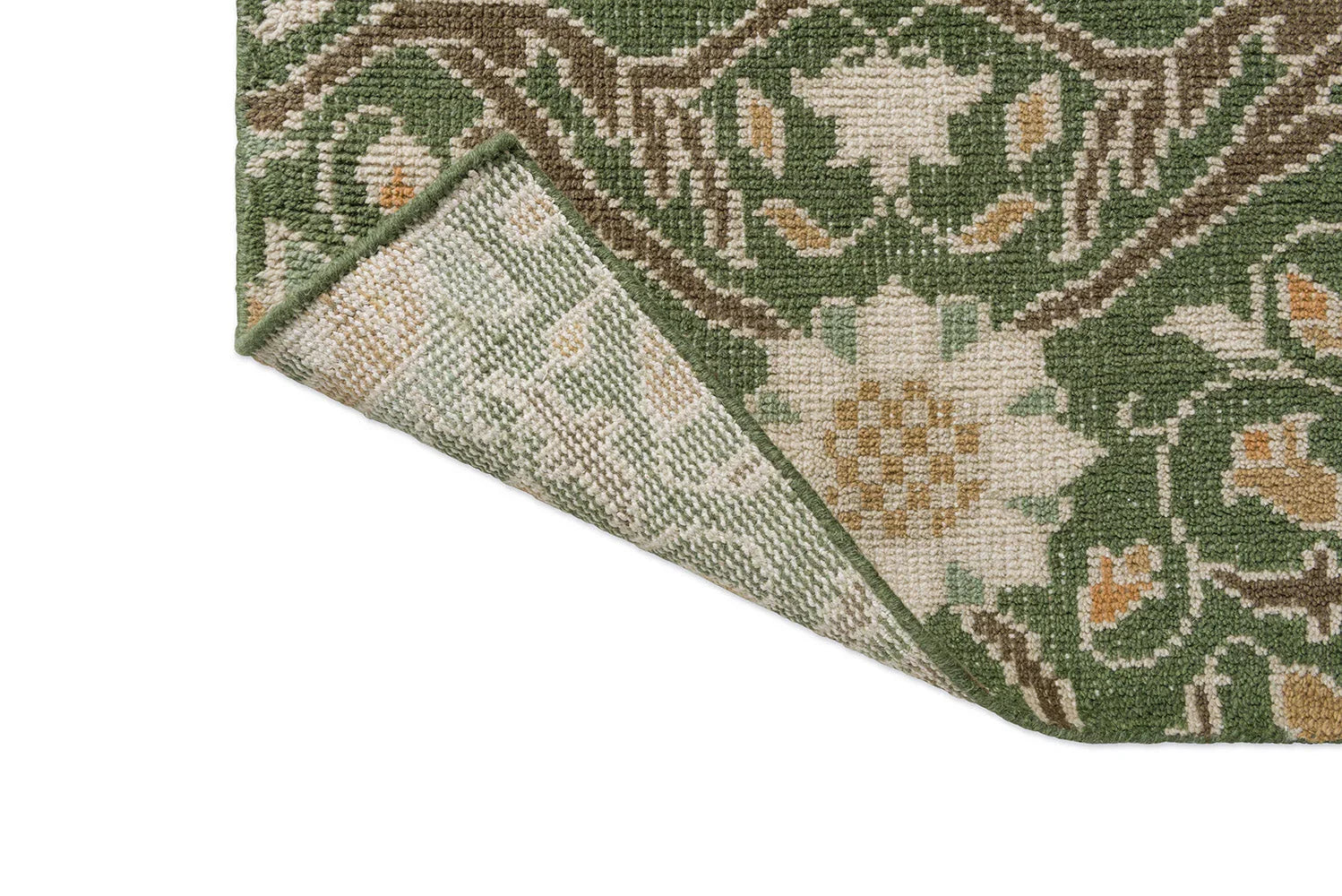 Morris & Co Montreal Forest Rug featuring botanical pattern in hunter green, sage, cream and brown on beige, hand-tufted wool