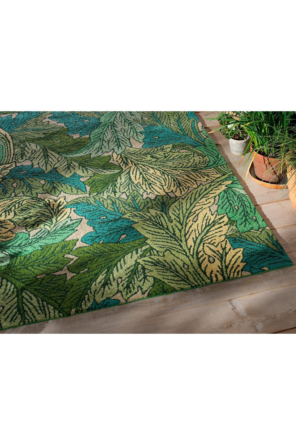 Morris & Co Acanthus Nettle outdoor rug featuring botanical acanthus leaves in sky blue, teal, olive green and cream on beige background, outdoor synthetic.