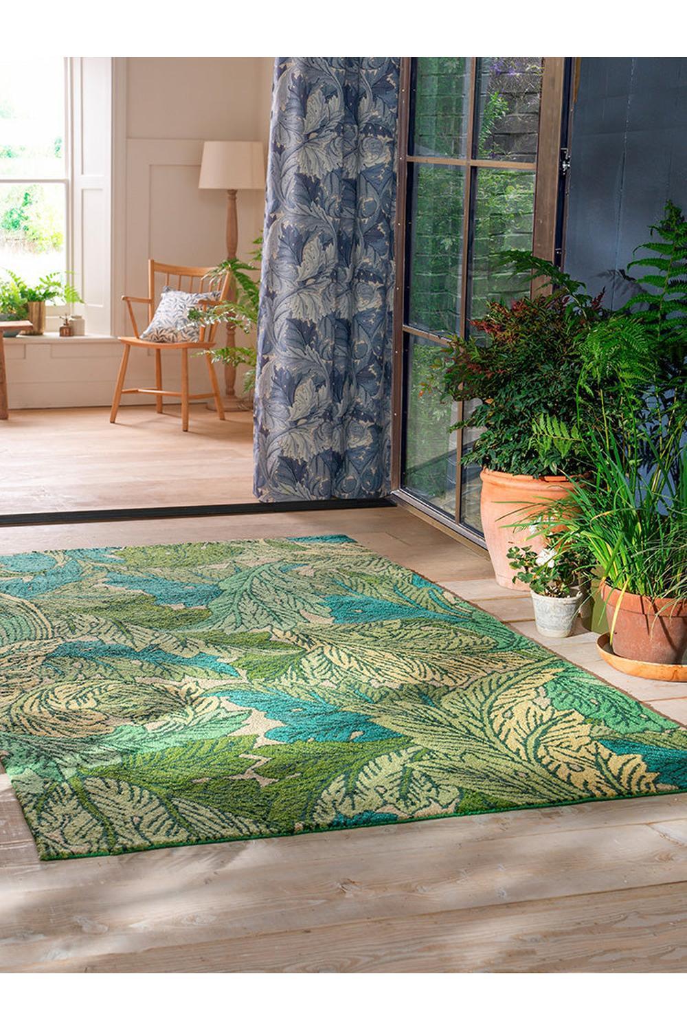 Morris & Co Acanthus Nettle Sky Blue Outdoor Rug featuring botanical acanthus leaves in sky blue, teal, lime and cream on beige background, machine-woven