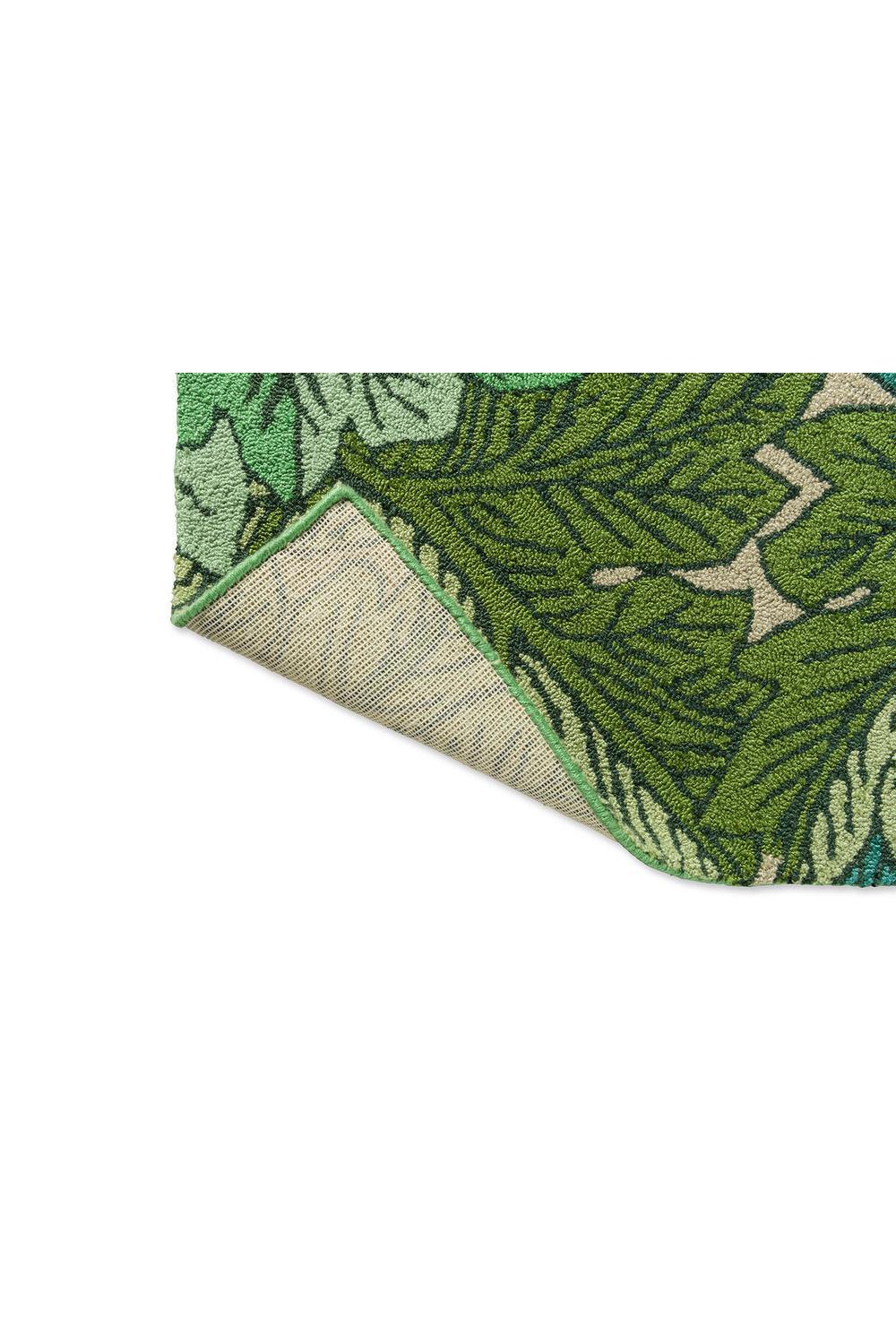 Morris & Co Acanthus Nettle outdoor rug featuring botanical acanthus in emerald green, lime, teal and cream on pale background, machine-made polypropylene