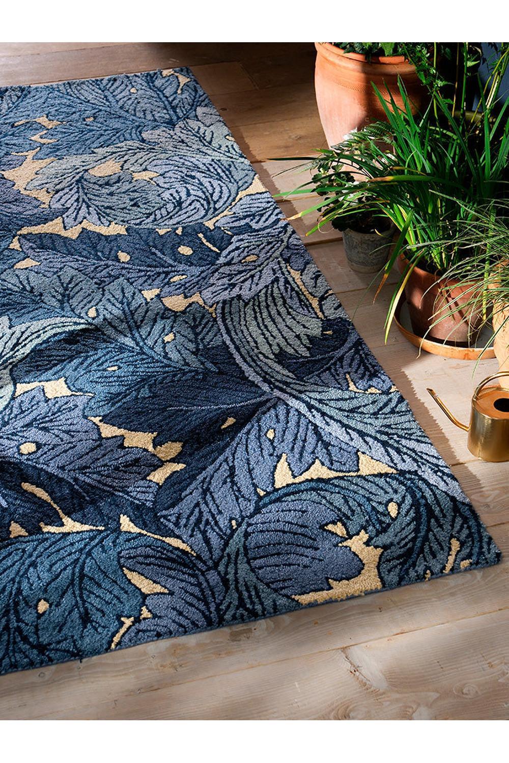Morris & Co Acanthus Indigo Outdoor Rug featuring botanical acanthus in indigo, navy, teal and cream on tan background, machine-made polypropylene