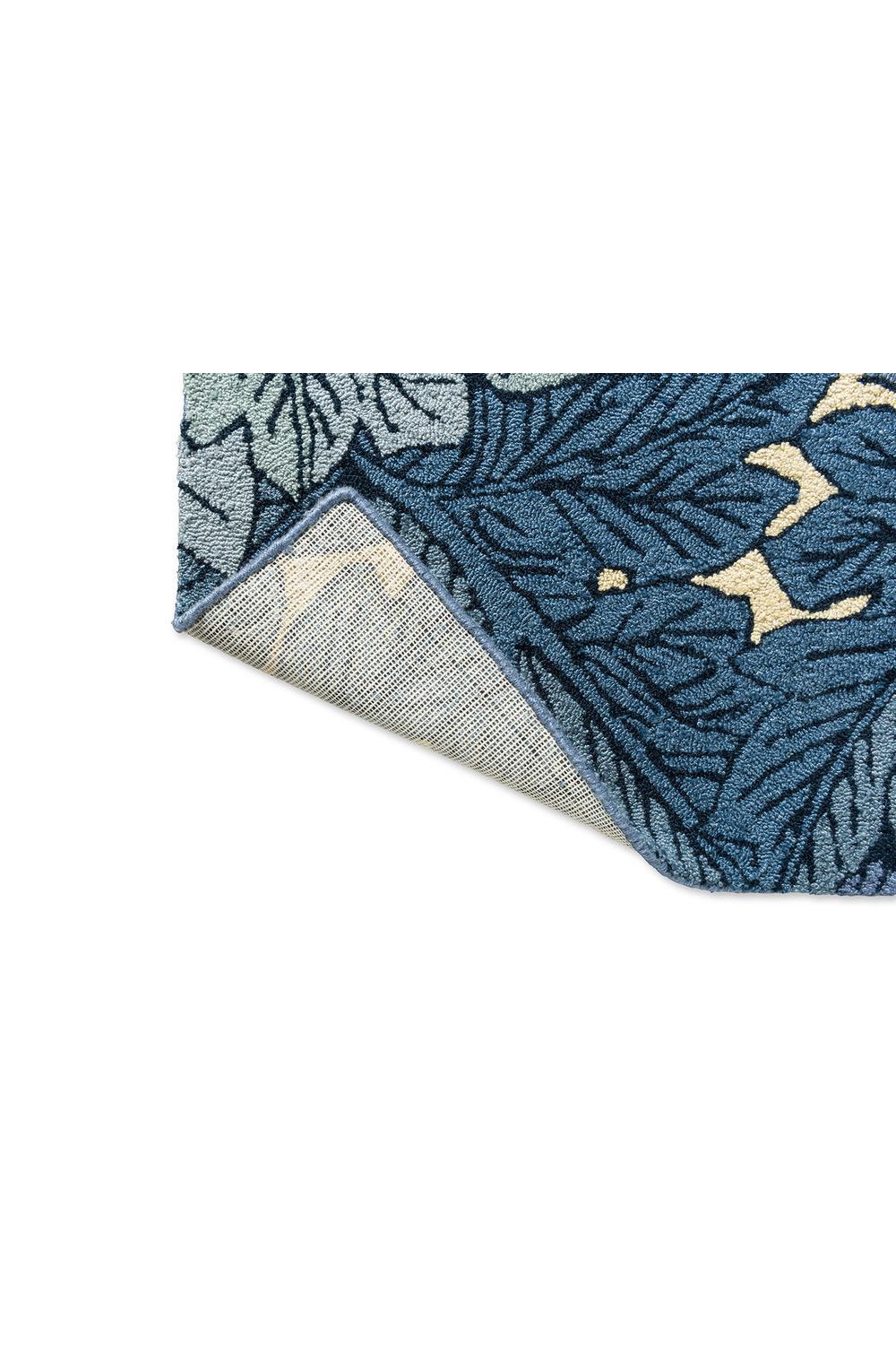 Morris & Co Acanthus Indigo outdoor rug with acanthus leaf pattern in indigo, navy and cream on deep blue background, machine-made polypropylene
