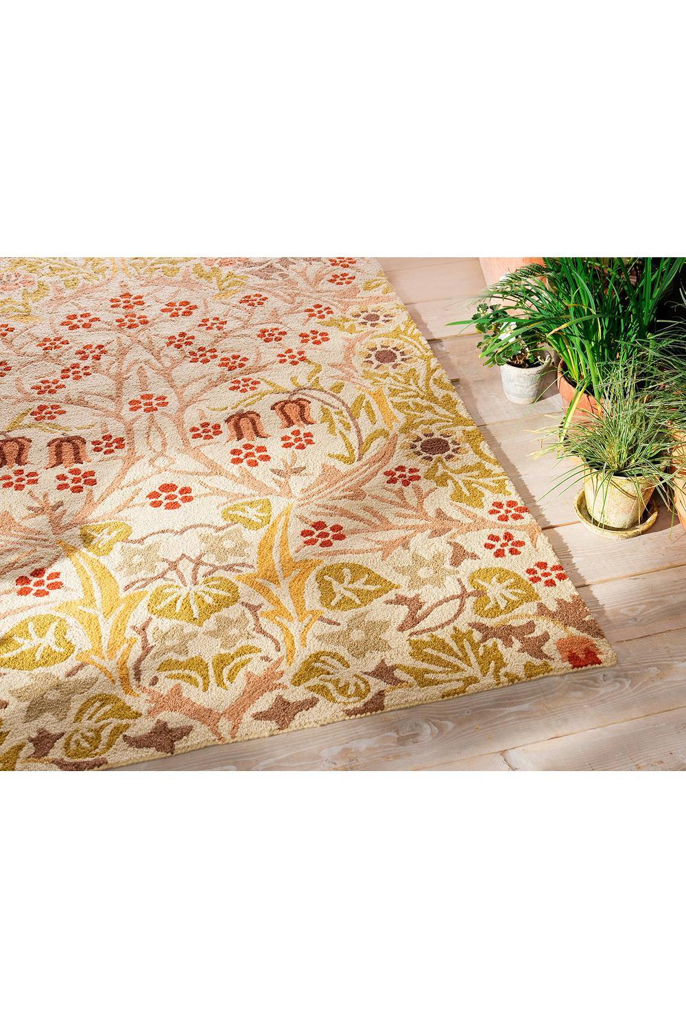 Morris & Co Blackthorn Wheat Outdoor Rug featuring botanical vine pattern in wheat, ochre, cream on beige; power-loomed polypropylene