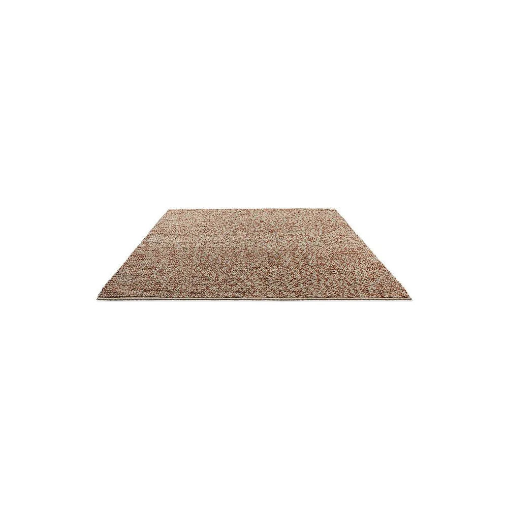 Brink & Campman Nest Leather Designer Rug featuring speckled pattern in tan, brown and cream on white background, hand-tufted wool