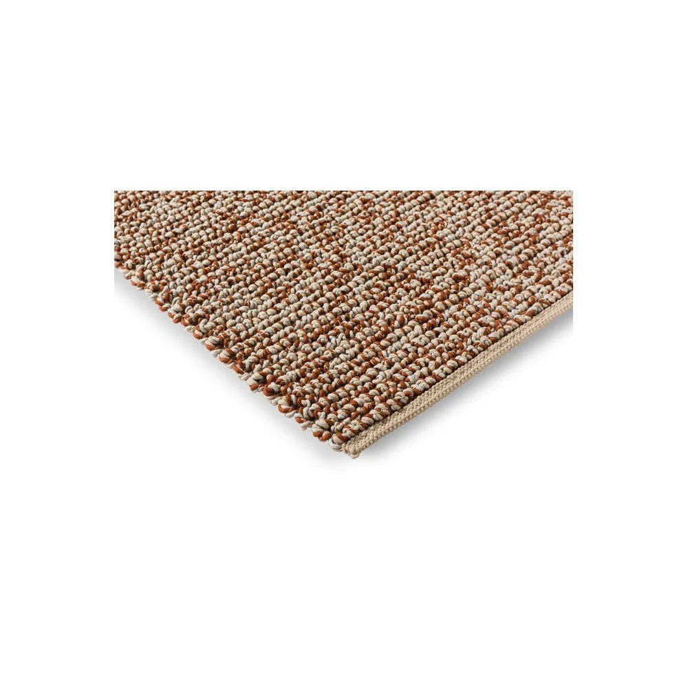 Brink & Campman Nest Leather Rug featuring textured boucle in brown, tan and ivory on warm beige, hand-tufted wool