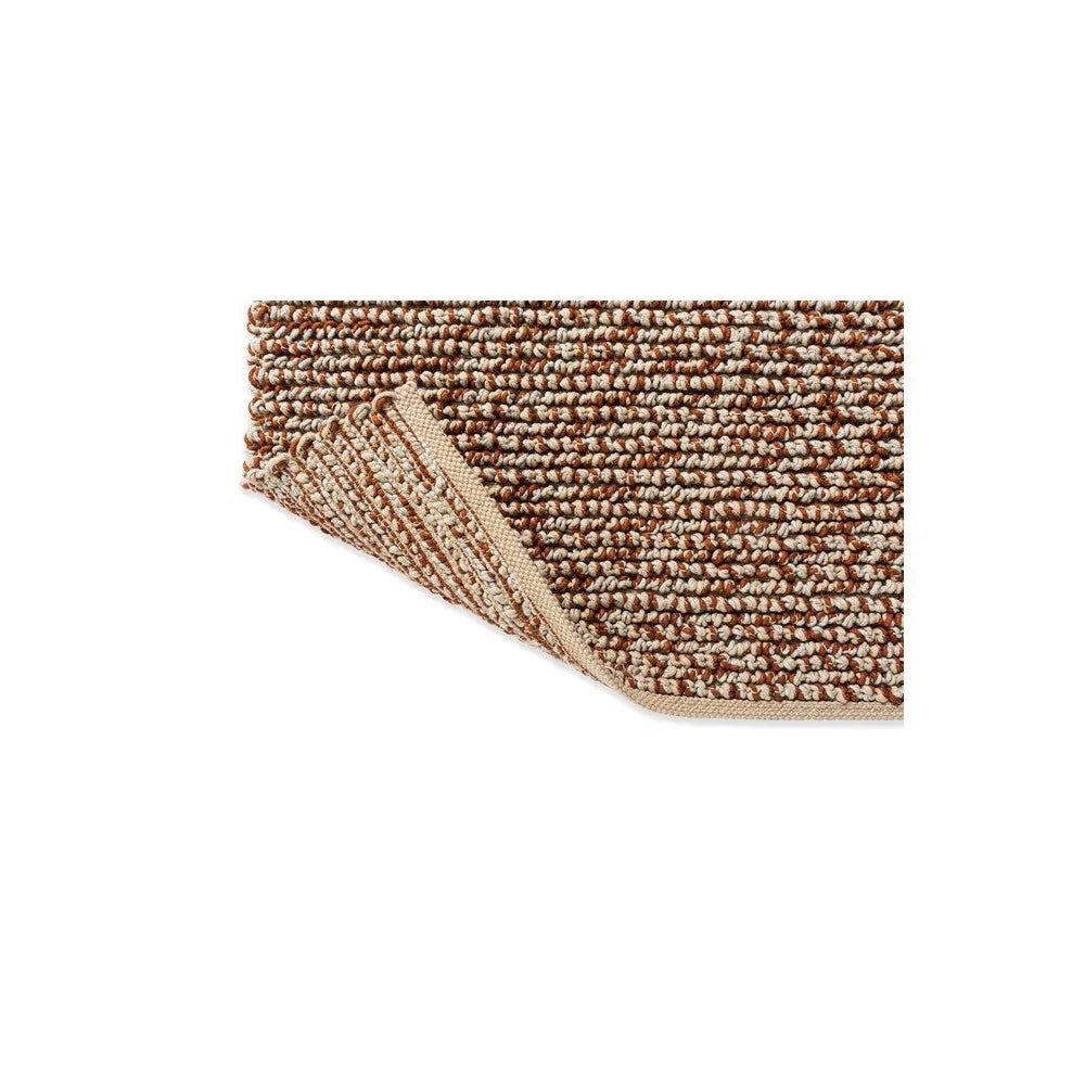 Brink & Campman Nest Leather Designer Rug featuring a woven looped texture in caramel brown, cream and beige on beige, hand-tufted wool