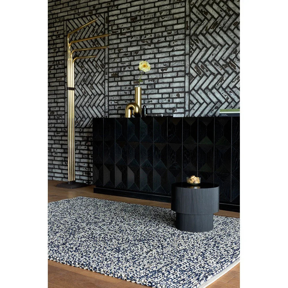 Brink & Campman Nest Ink Rug featuring speckled textured pattern in navy blue, cream and ivory on light beige background, hand-tufted wool
