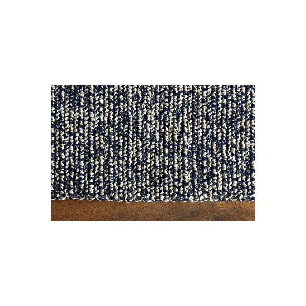 Brink & Campman Nest Ink Rug featuring chunky woven stripe in navy and ivory on dark background, hand-loomed wool