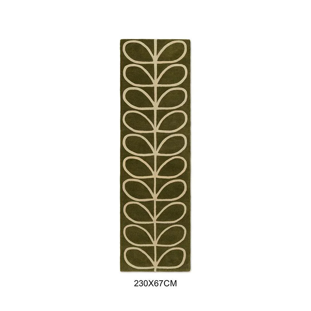 Orla Kiely Linear Stem Olive Designer Rug featuring botanical leaf pattern in olive green and cream on olive background, machine-woven wool