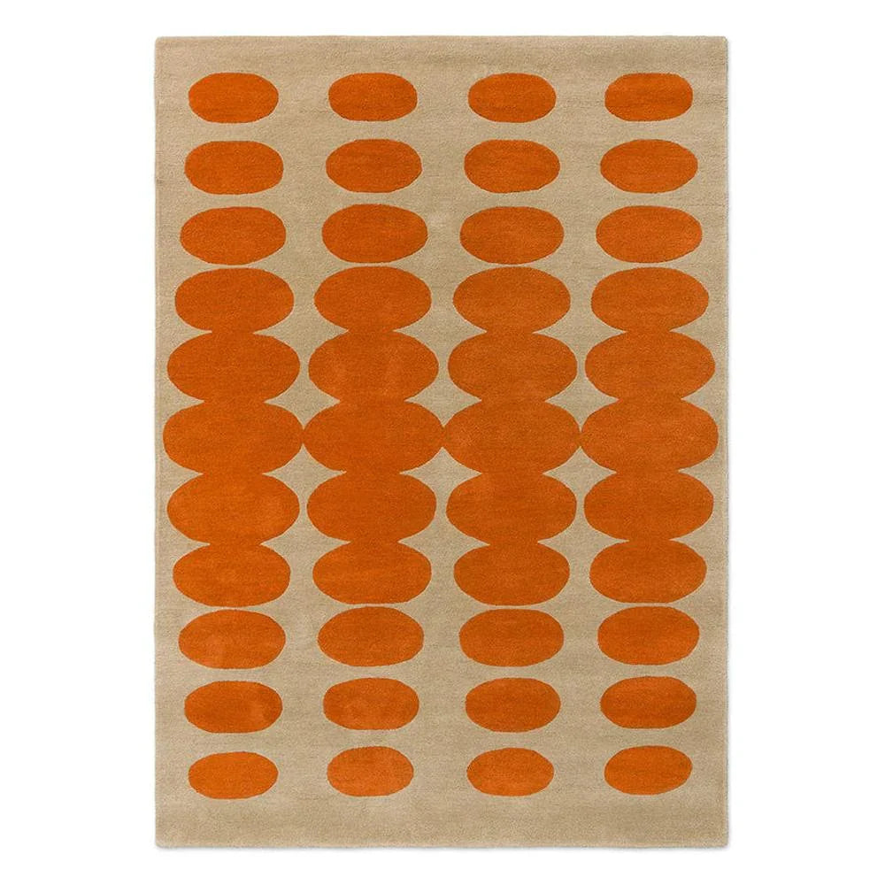 Orla Kiely Optical Oval Orange Sand hand-tufted wool rug featuring hypnotic interlocking oval pattern in rich burnt orange on soft sand beige background
