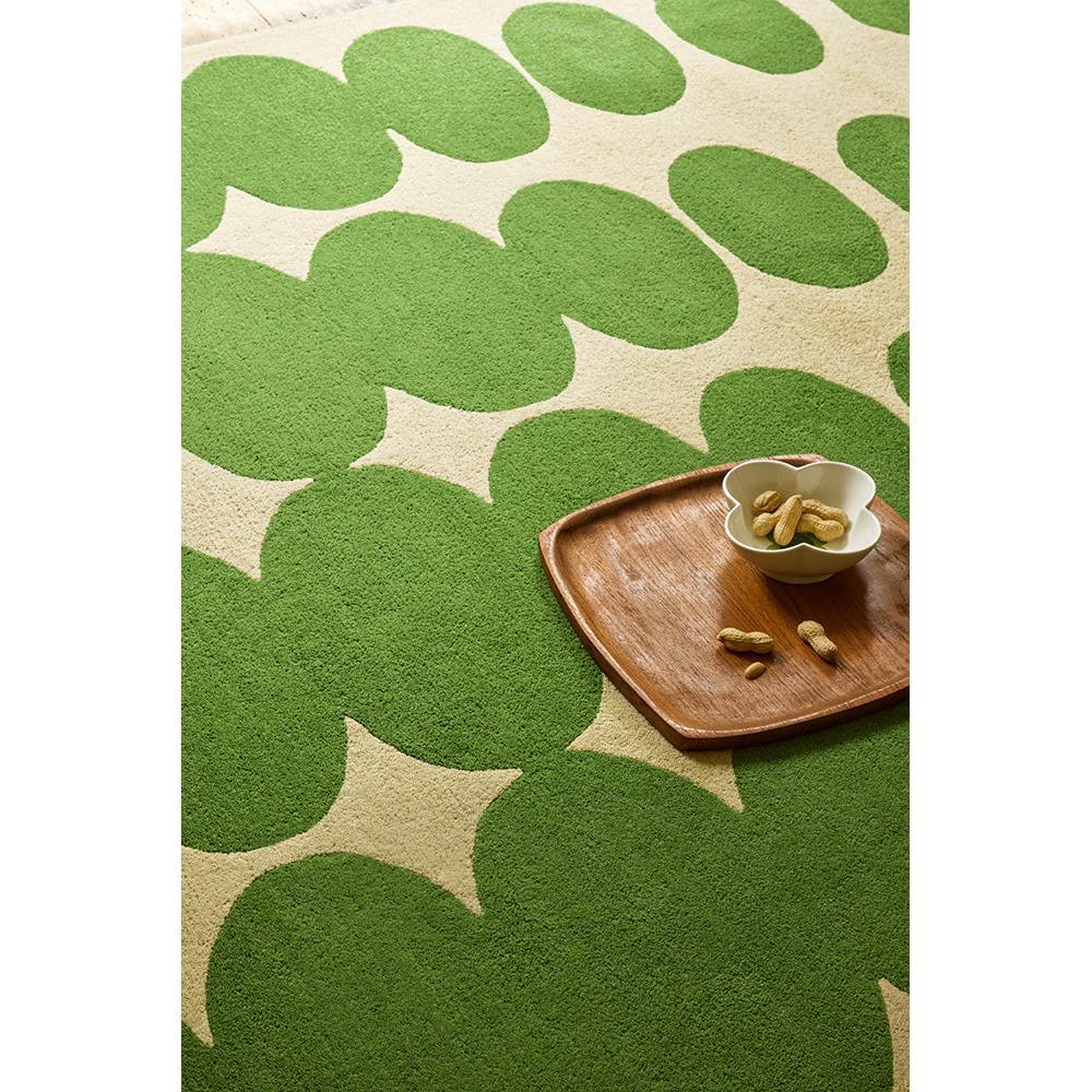 Orla Kiely Optical Oval Green Cream Designer Rug featuring olive green and cream oval pattern on cream background, hand-tufted wool