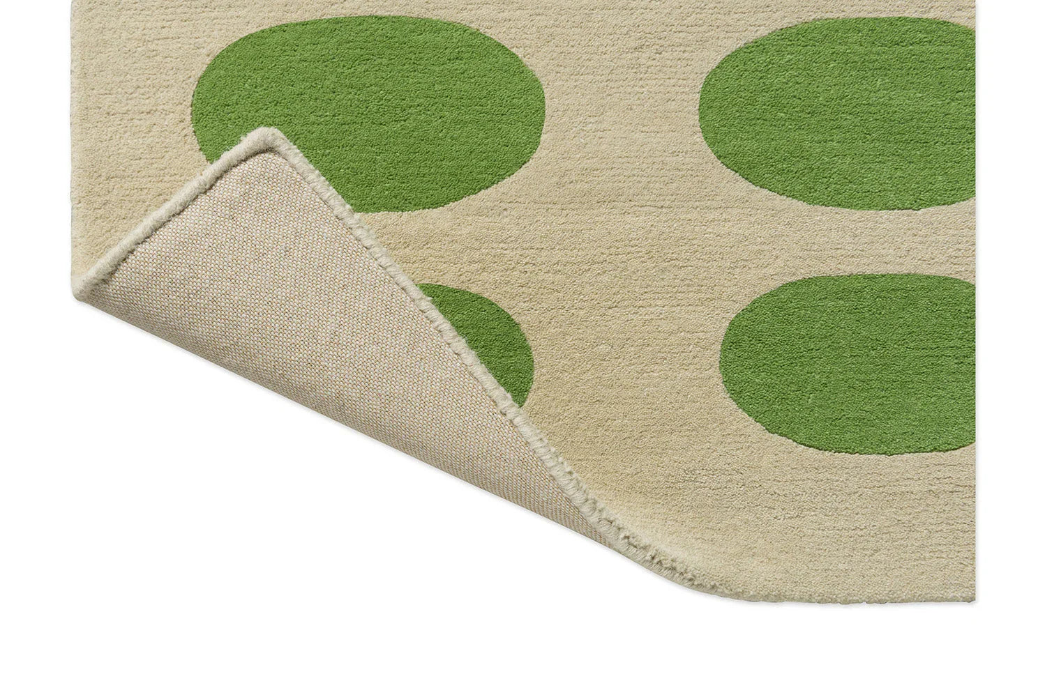 Orla Kiely Optical Oval Rug featuring oval pattern in emerald green and lime on cream background, hand-tufted wool
