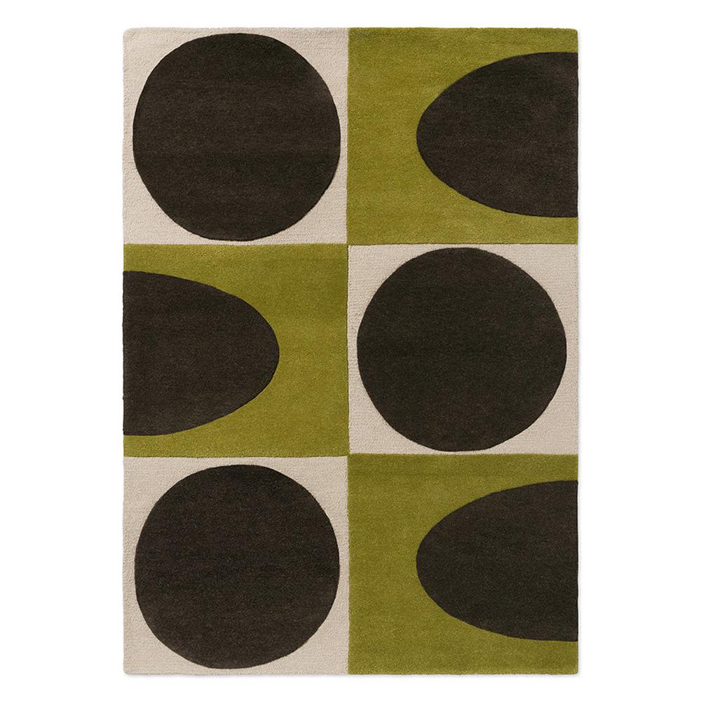 Orla Kiely Spot Square Walnut Lichen hand-tufted wool rug featuring bold mid-century geometric pattern with chocolate brown circles and half-circles on vibrant lichen green and cream blocks
