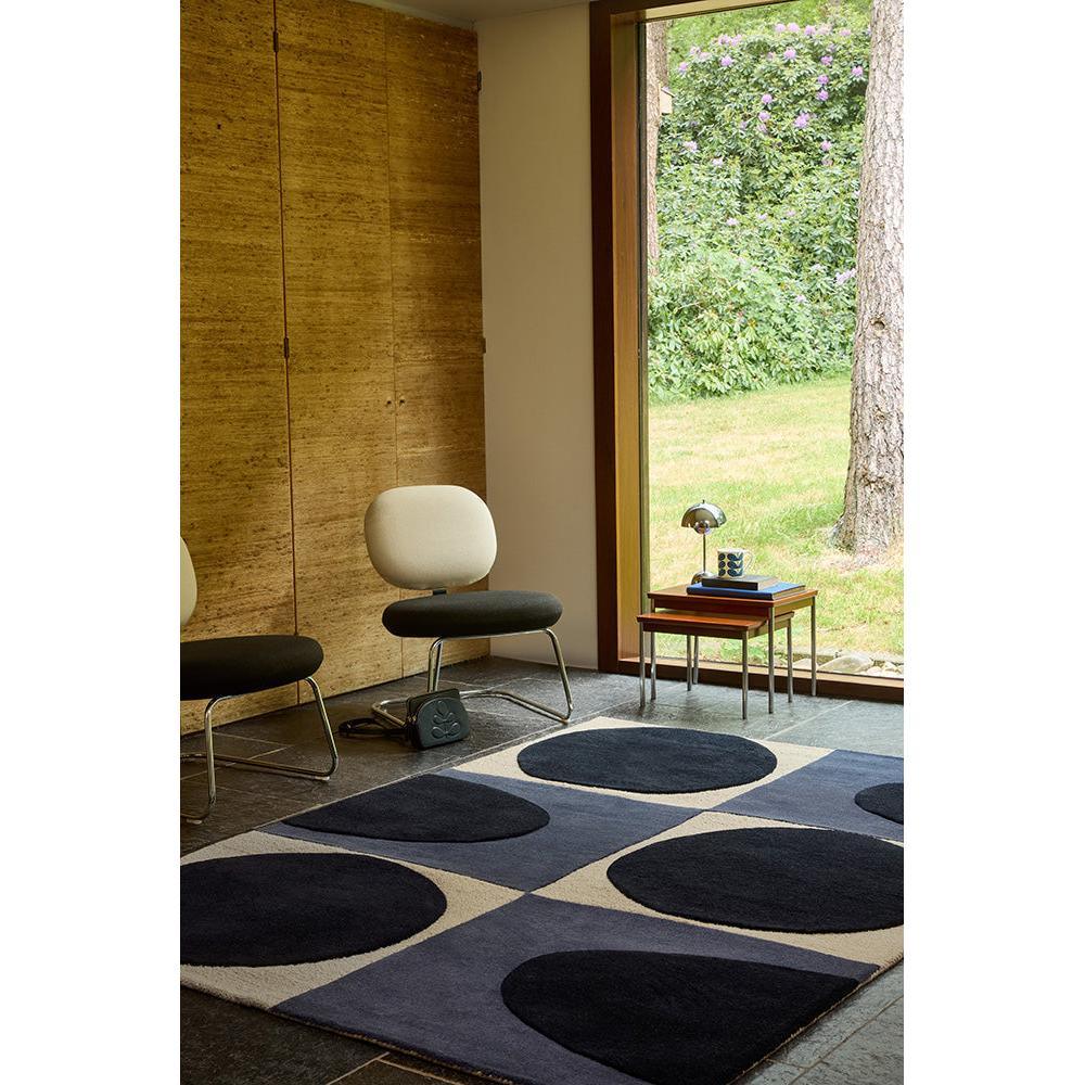 Orla Kiely Spot Square Blue Navy Designer Rug featuring circular spot pattern in navy and cream on beige background, hand-tufted wool