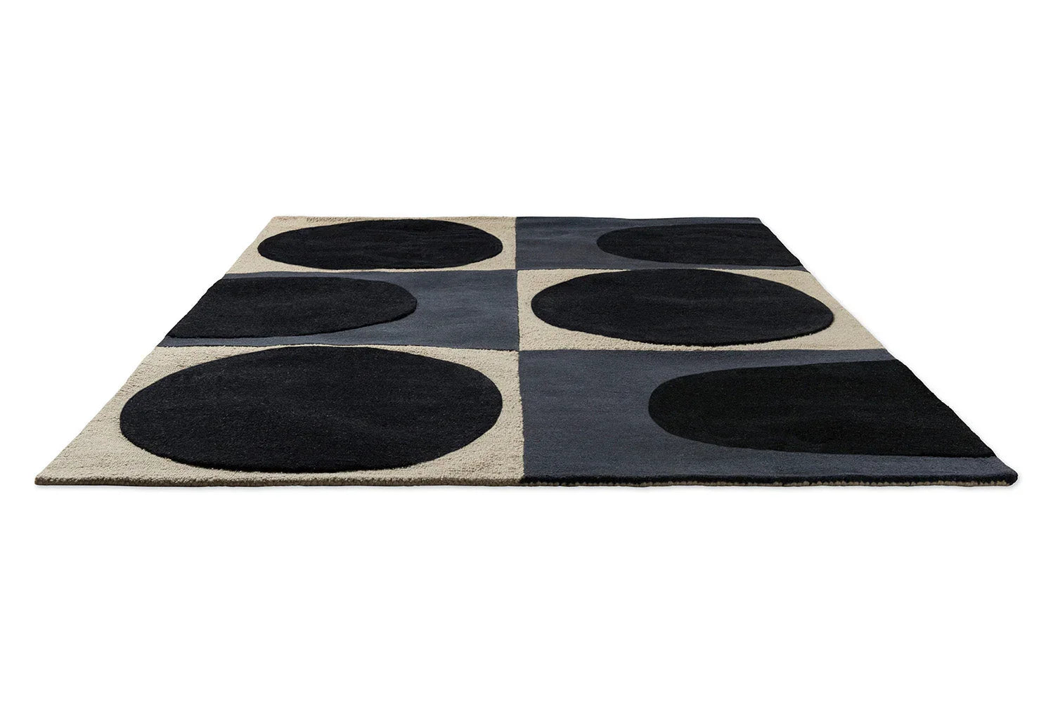 Orla Kiely Spot Square Rug featuring large circle dots in navy, blue-grey, and beige on cream background, machine-woven wool-blend