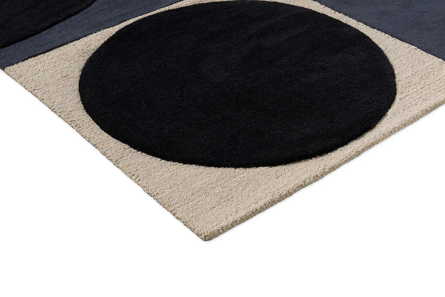 Orla Kiely Spot Square Rug featuring circular pattern in navy blue, black and cream on beige background, hand-tufted wool
