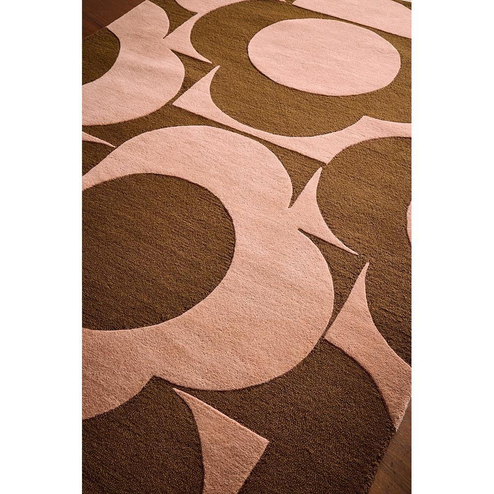 Orla Kiely Prism Flower Rug featuring abstract floral pattern in pink and terracotta on brown background, hand-tufted wool