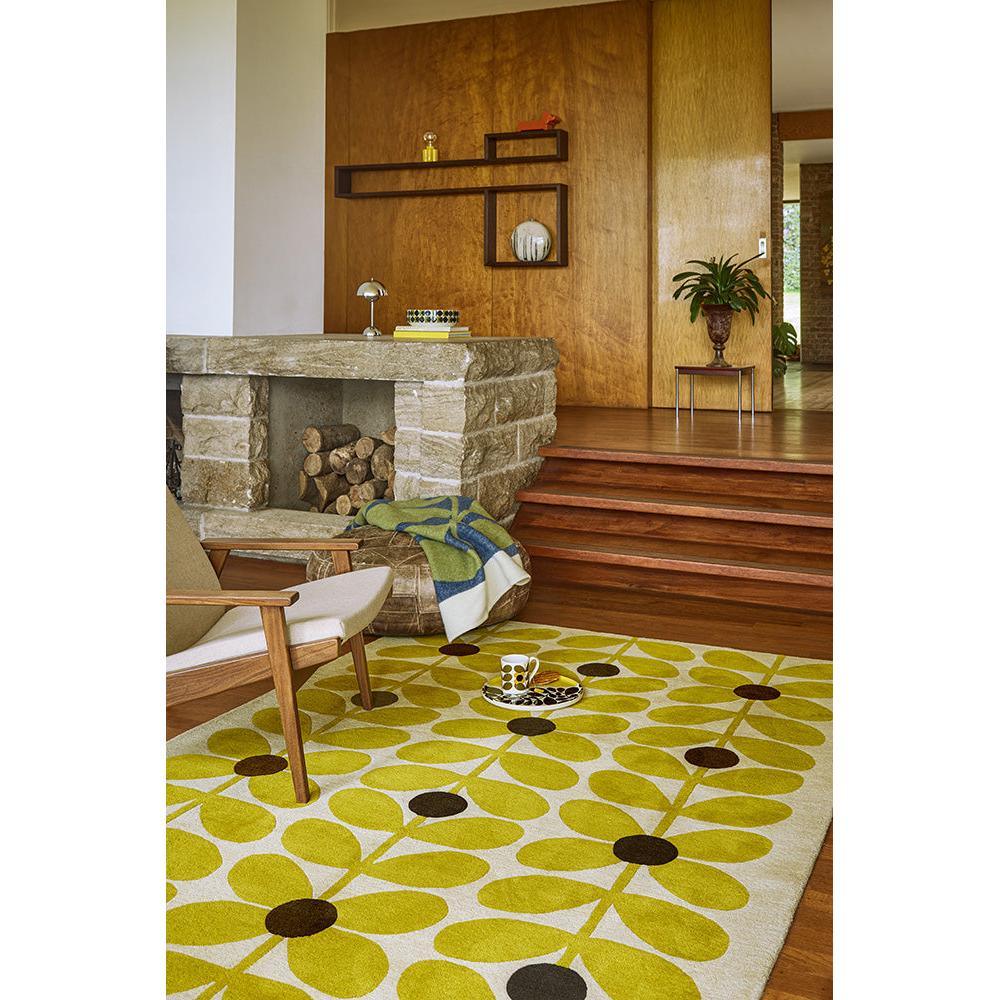 Orla Kiely Sixties Stem Yellow Rug featuring retro stem pattern in lime, mustard, brown on cream background, machine-woven wool