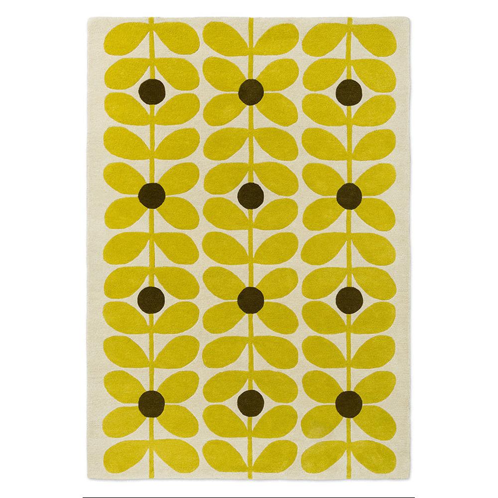 Orla Kiely Sixties Stem Yellow hand-tufted wool rug featuring iconic stem leaf pattern with bright chartreuse yellow stylised flowers and olive brown centres on cream background
